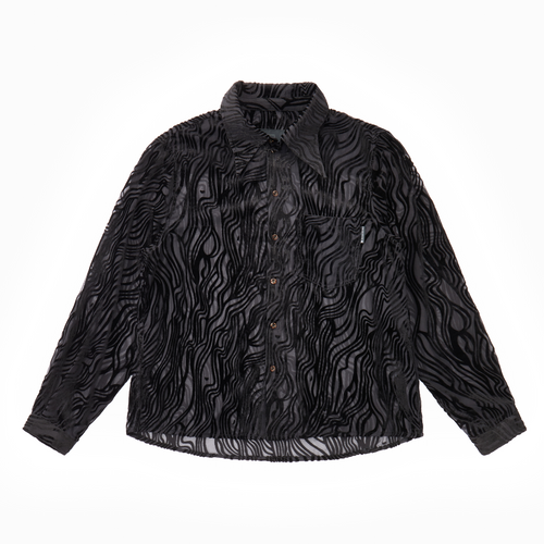 Sheer black wavy velvet patterned shirt on a white background