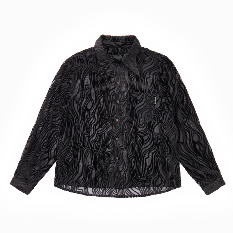Sheer black wavy velvet patterned shirt on a white background