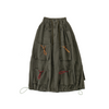 Green cargo skirt with multiple pockets on a white background