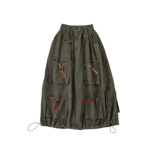 Green cargo skirt with multiple pockets on a white background