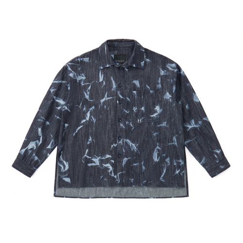 Dark denim shirt with abstract bleached pattern on a white background