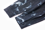 Close-up of a long-sleeved dark denim blue shirt with cuff sleeves 