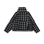 Black and white plaid jacket on a white background