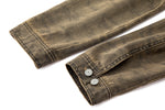 Brown denim jacket with close up on sleeves