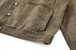 Close-up of a brown denim jacket