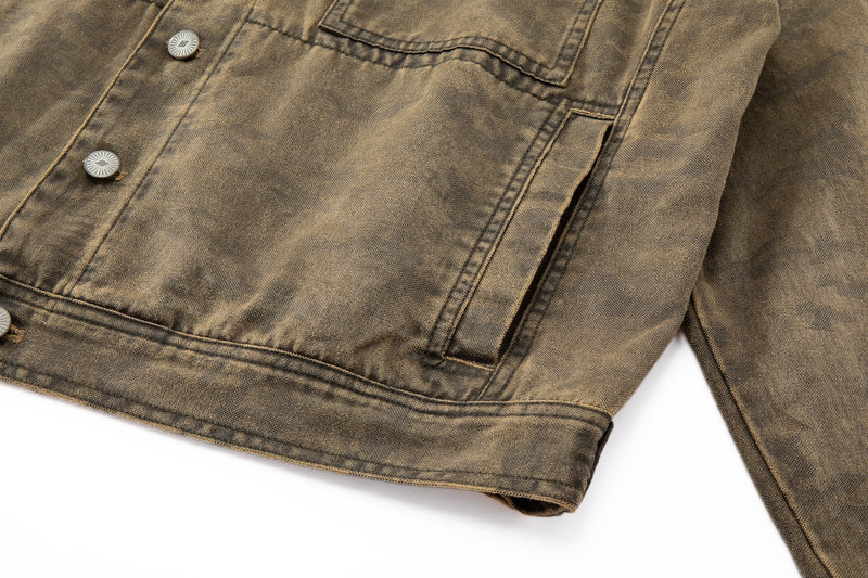 Close-up of a brown denim jacket