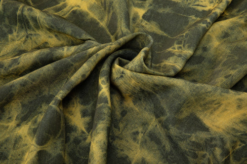 Close-up of green and yellow tie-dye fabric