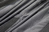 Close-up of gray fabric with a textured surface