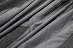 Close-up of gray fabric with a textured surface