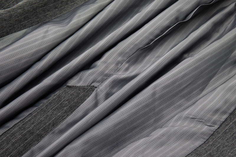 Close-up of gray fabric with a textured surface