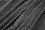 Close-up of charcoal grey colorway with tonal vertical stripe pattern